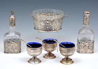 Grouping of German silver salt cellars, two decanters, and silver/glass bowl
