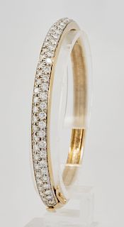 14k Yellow gold & diamond bangle bracelet, 25.2g.
