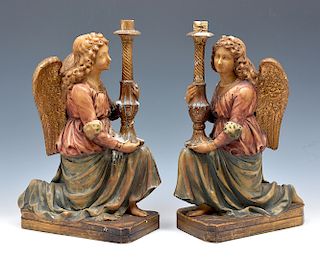 Pair of continental alabaster and polychrome angel form candle holders