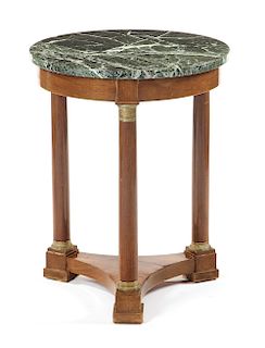 Empire style gilt metal mounted marble top circular table