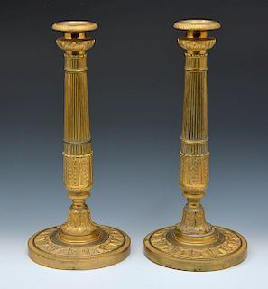 Pair of 19th Century Charles X gilt bronze candlesticks