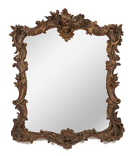 Rococo style carved and parcel gilt mirror