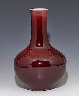 Chinese oxblood vase with stand