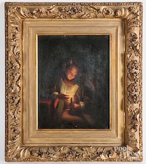 Oil on canvas of a woman reading by candlelight