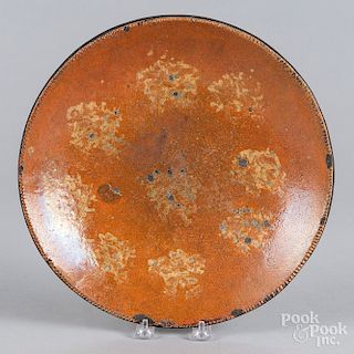Slip decorated redware charger