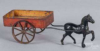Cast iron horse drawn tin cart