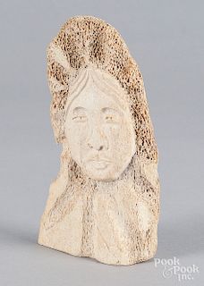 Inuit carved bone portrait