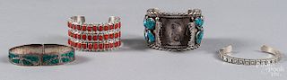 Four Native American sterling silver bracelets