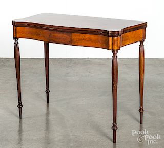 New England mahogany serpentine front card table