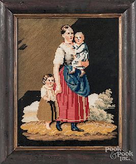 Wool needlework of a mother and children