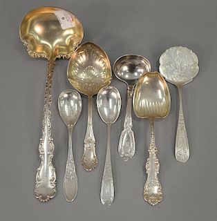 Seven piece sterling silver lot to include one large ladle (lg. 12 1/2in.), one small ladle, and five serving spoons. 17.2 total tor...