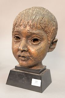 Bronze sculpture of a youth, in the manner of Sir Jacob Epstein, mounted on a stepped black marble base. ht. 10 1/4in.