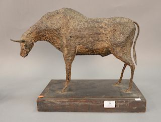 Bronze sculpture of a bull, after a model by N. Hales, mounted on a wood base. ht. 13in., lg. 19in.