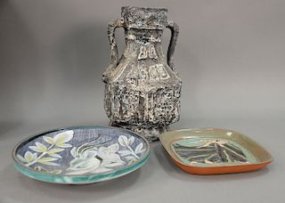 Three piece group to include Harris Strong Studio pottery goat tray (10" x 10"), Tilgthatis pottery goat charger (dia. 12in.), and a...