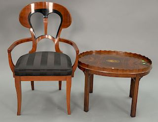 Two piece lot to include an armchair and a mahogany coffee table. table: ht. 19in., top: 20" x 27 1/2"