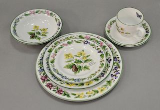 Royal Worcester porcelain dinner set having "Herbs" pattern, serves for seven plus extras, sixty total pieces.