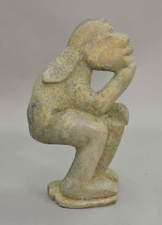 Carved stone figure with long ears playing bongo, signed illegibly on base repaired). ht. 26in., wd. 15 1/2in.
