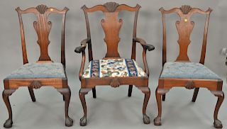 Set of three custom mahogany Chippendale style chairs with shell carved backs.