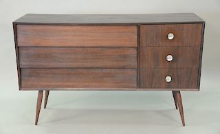 1950's composition credenza having sie channeled drawers, oak interior boards, and Ivan drawer bottoms. ht. 38in., wd. 62in., dp. 18in.