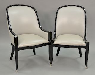 Set of ten gondola-back leather upholstered dining chairs having gloss black lacquered wood frame, scalloped edge in front, nickel p...