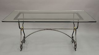 Glass top table with iron brass trimmed base. ht. 29in., top: 36" x 89"