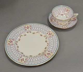 Twenty-one piece Minton breakfast set to include six plates, six cups and saucers, teapot, sugar, and creamer with raised enamel.