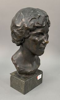 Bronze bust of a woman on granite base, marked C.H.W. total ht. 18 1/2 in.