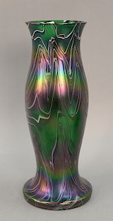 Tall Loetz art glass green vase having iridescent swirl design.