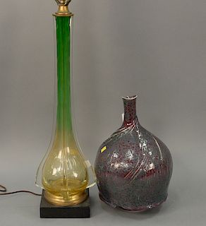 Two piece lot to include Murano glass table lamp (total ht. 42in.) and a purple glazed porcelain vase (ht. 23in.)
