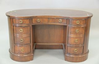 Sligh mahogany leather top kidney shaped desk. ht. 29 1/2in., top: 23" x 54"