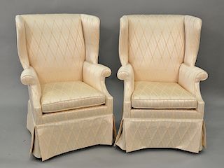 Pair of custom silk upholstered chippendale style wing chairs (one with small tear on right side). ht. 43in.