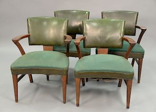 Set of four Gilbert Rohde style Gunlocke chairs having leather backs.