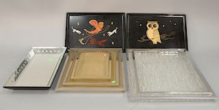 Eight piece total lot to include two Couroc inlaid trays, set of three fishnet acrylic trays with metal trim, and pair of acrylic tr...