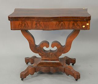 Empire mahogany game table. ht. 30 1/2in., wd. 35in., dp. 18in.