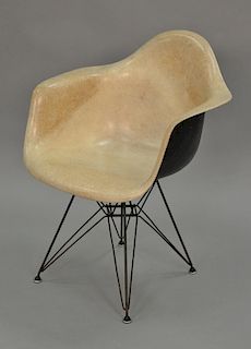 Eames Fiken glass chair with Eiffel Tower bass.