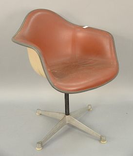 Eames chair with swivel base.