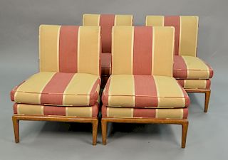 Four lounge chairs in the style of Robsjohn Gibbings.