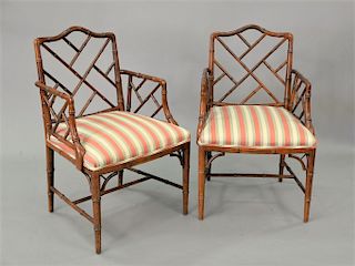 Pair of faux bamboo Chinese chippendale style arm chairs.
