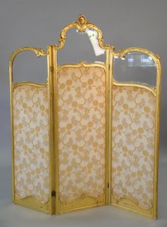 Louis XV style gilt three part dressing screen with bevel glass panels. ht. 74in., wd. 62in.