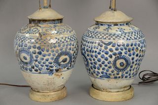 Two blue and white ceramic glazed jars made into table lamps. hts. 25in. total