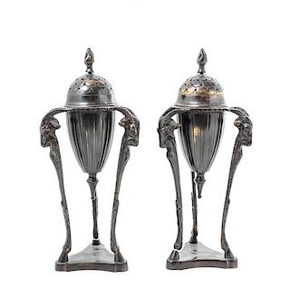 * A Pair of Neoclassical Cast Metal Urns on Stand Height overall 11 3/4 inches.