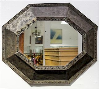 An Embossed Copper Mirror Height 18 1/4 x width 22 inches.
