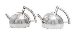 A Pair of Italian Stainless Steel Kettles Height 6 7/8 x width 11 inches.