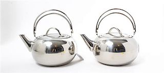 A Pair of Stainless Steel Kettles Height 8 3/4 x width 9 1/2 inches.