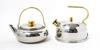 Two Stainless Steel Kettles Height of taller example 8 x width 9 3/4 inches.