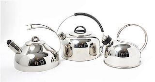 Three Stainless Steel Tea Kettles Height of tallest 8 1/4 inches.