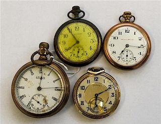 A Collection of Four Pocket Watches Height of largest 3 1/8 inches.