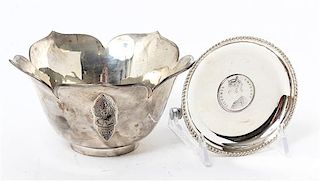 Two Silver Articles, 20th Century, comprising a lotus form bowl and circular tray inset with a coin.