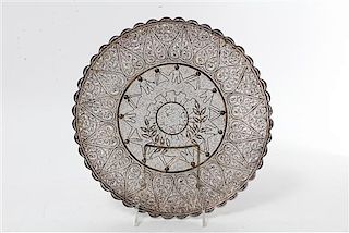 A Silvered Metal Filigree Tray, , of circular form. with a fitted box.