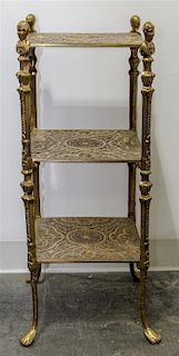 A Brass Etagere Height 29 x width 11 x depth 11 inches.